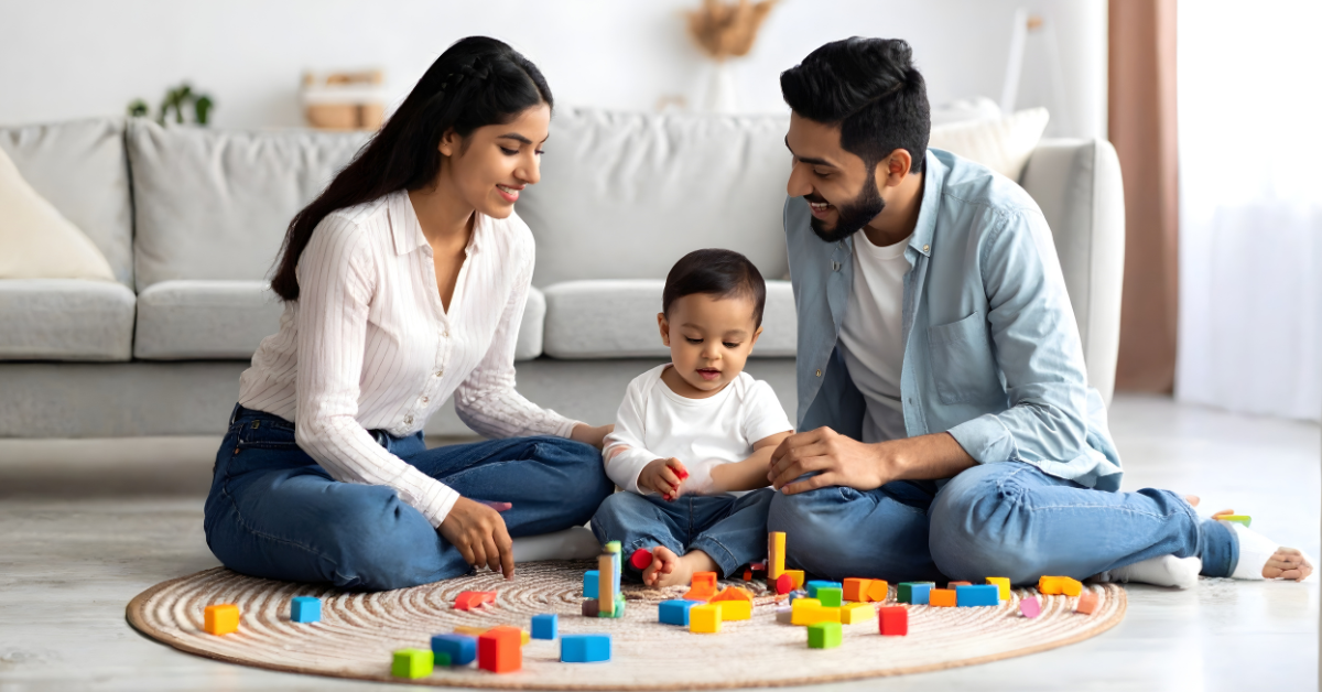Parents and a young child playing together on the floor, showing a cooperative co-parenting environment at home.